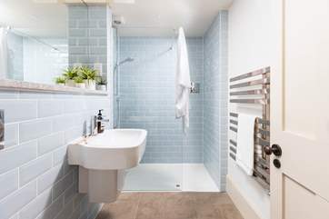 This baby blue shower-room on the ground floor.