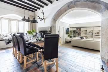 The beautiful stone archway between the sitting-area and the dining-area.