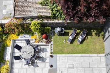 The secluded outside space is perfect for al fresco dining and relaxing in the sun.