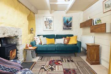 Warm your toes by the wood-burner in the super cosy sitting-room.