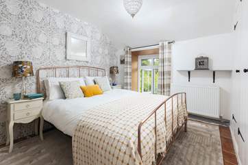 Elegant master bedroom is beautifully furnished (Bedroom 1).