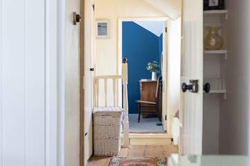 The landing leads to the bedrooms and family bathroom, please watch your step.