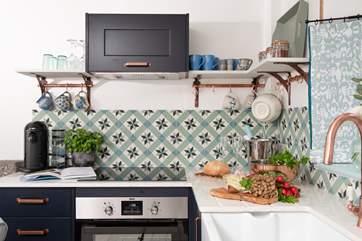 The compact kitchen is small but very well-equipped.