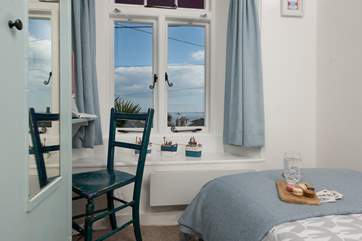The single bedroom has a convenient desk.