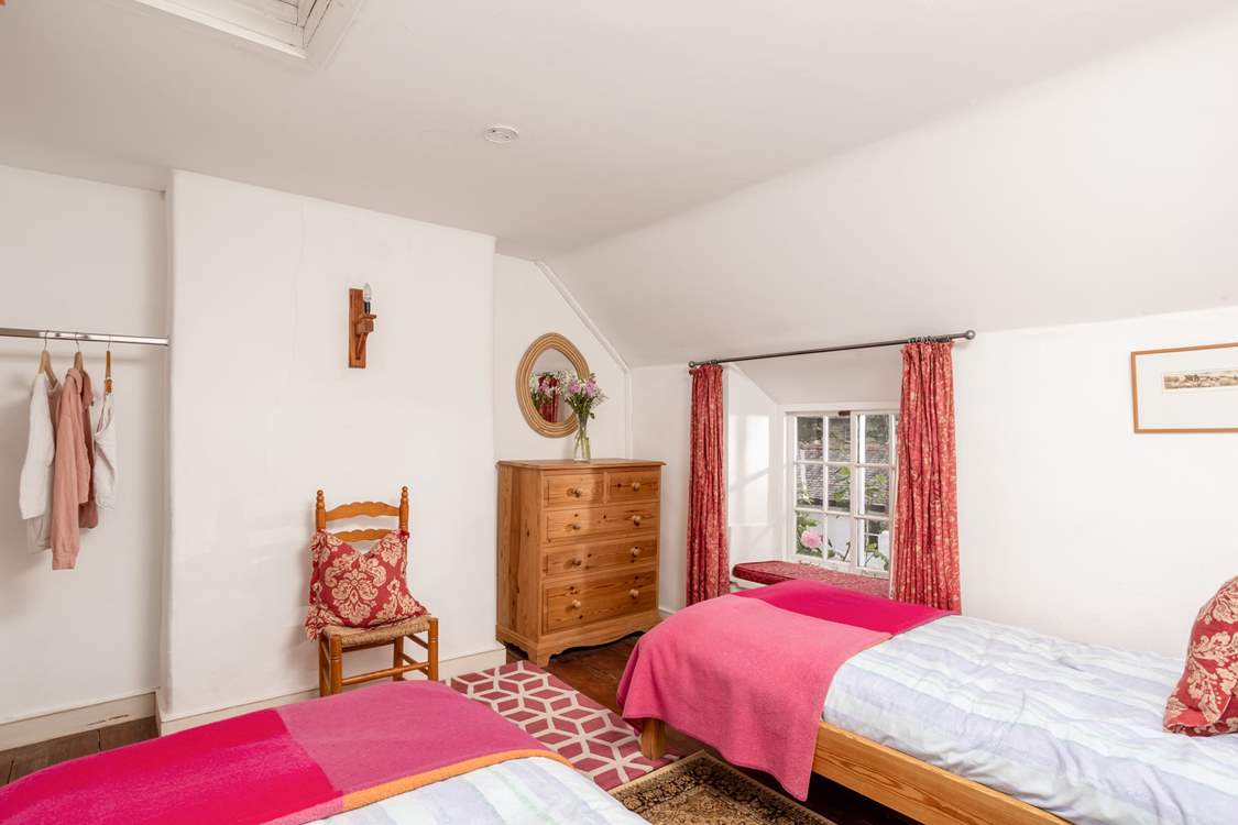 This bedroom (Bedroom 3) is charming and traditionally presented.