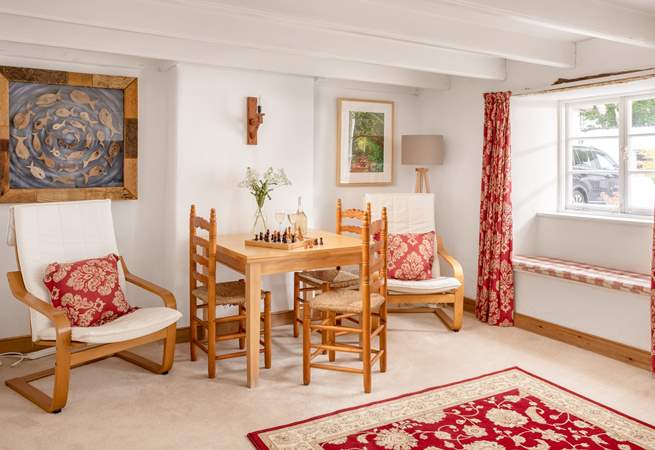 The sitting-room has a table and chairs which is perfect for a game of chess perhaps or to plan the next day's adventures. 
