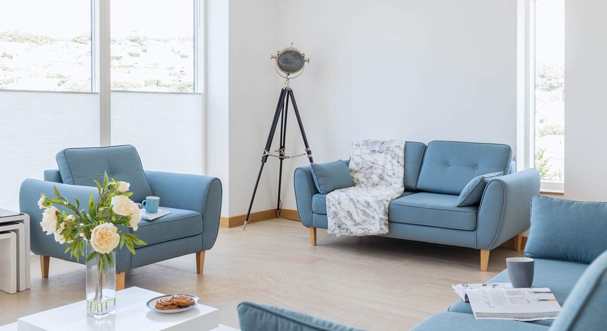 Relax in the sitting-area of the open plan first floor.