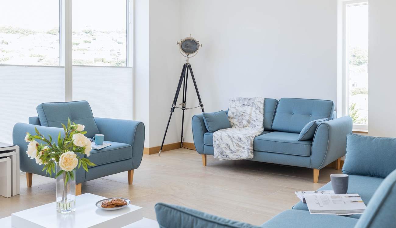 Relax in the sitting-area of the open plan first floor.