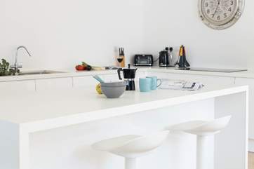 The super sleek kitchen is ideal for sociable times.