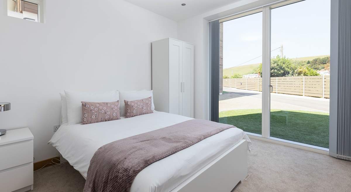 Wake up and let the sun in to bedroom two with the super comfy bed and luxury bedding.