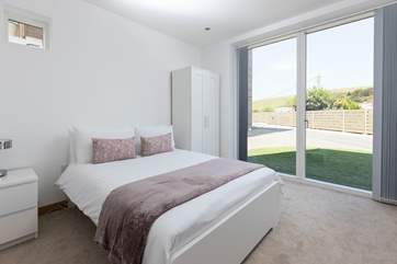 Wake up and let the sun in to bedroom two with the super comfy bed and luxury bedding.