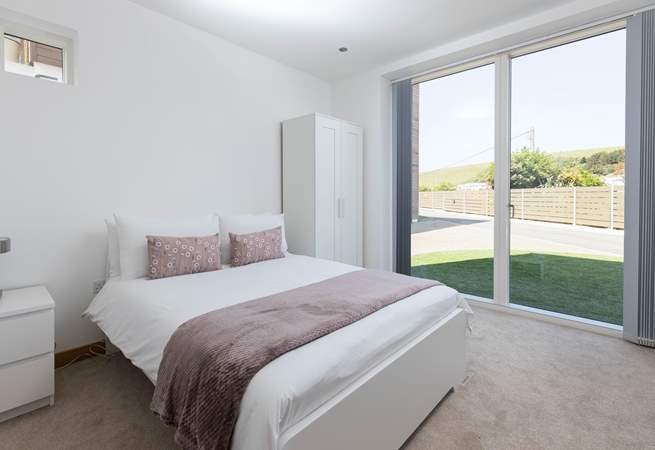 Wake up and let the sun in to bedroom two with the super comfy bed and luxury bedding.