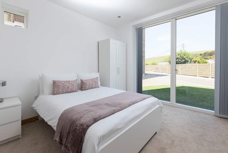 Wake up and let the sun in to bedroom two with the super comfy bed and luxury bedding.