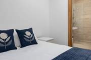 Bedroom one has a fabulous en suite shower-room and luxury bedding.