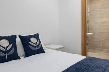 Bedroom one has a fabulous en suite shower-room and luxury bedding.