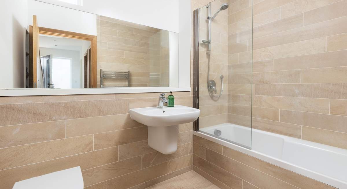 The family bathroom, perfect for a long soak after a day on the beach.