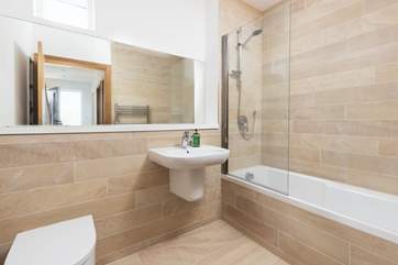 The family bathroom, perfect for a long soak after a day on the beach.
