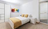 Bedroom three has oodles of space and plenty of storage. - Thumbnail Image