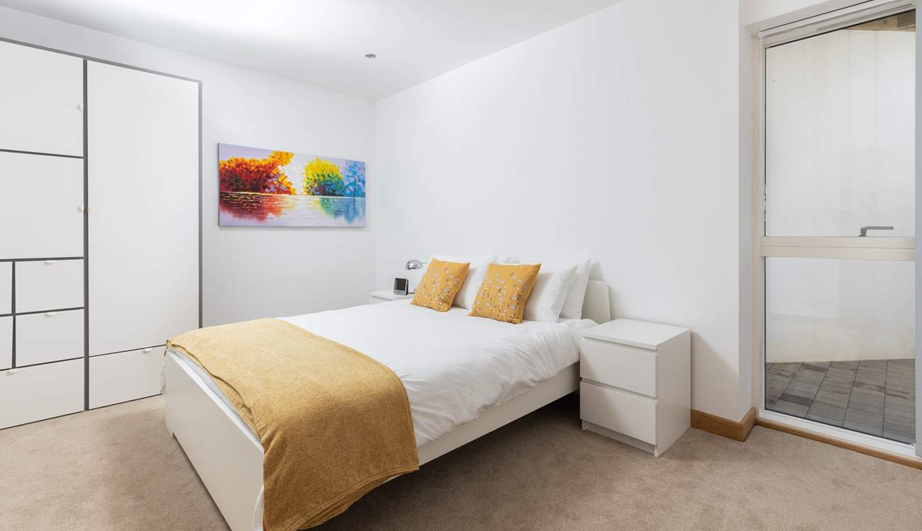 Bedroom three has oodles of space and plenty of storage.