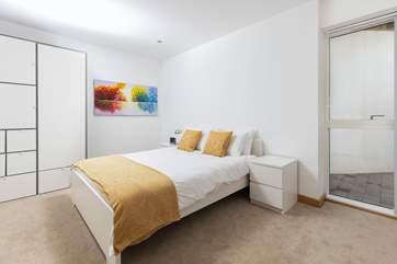 Bedroom three has oodles of space and plenty of storage.