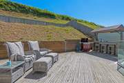 The secluded decked area is the perfect place to enjoy the sun.