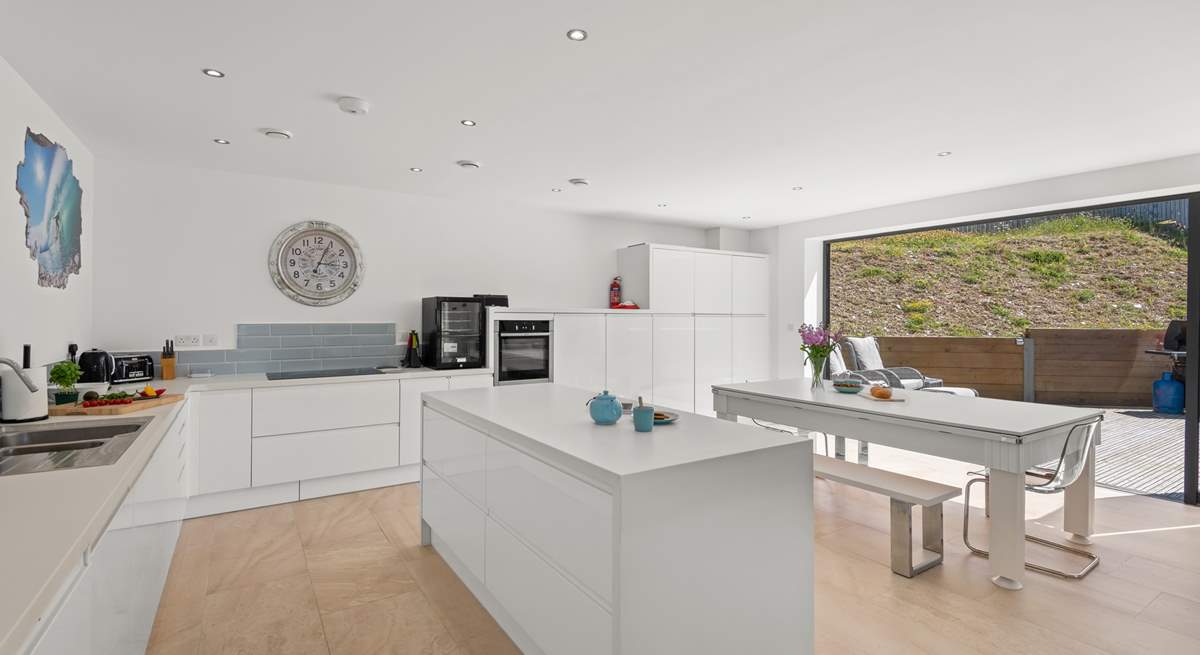 The super sleek kitchen is ideal for sociable times.