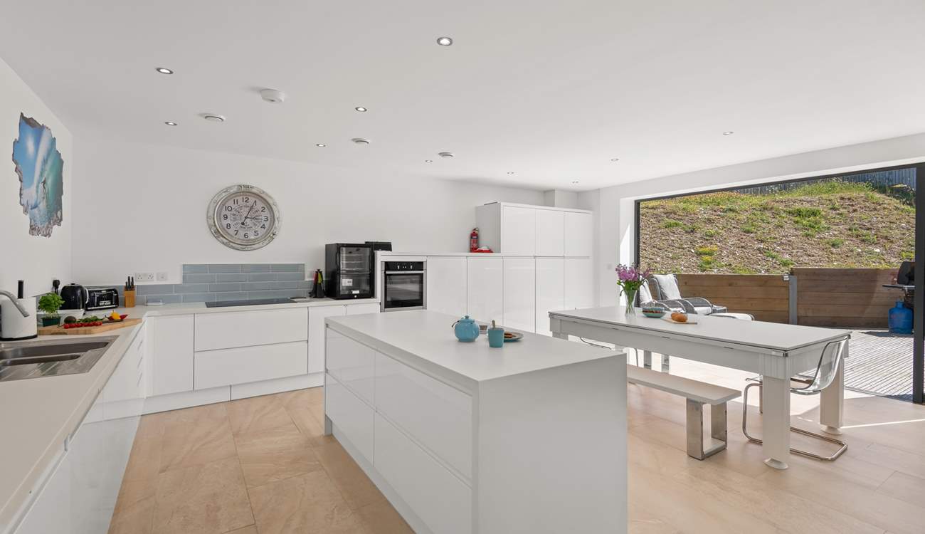The super sleek kitchen is ideal for sociable times.
