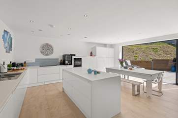 The super sleek kitchen is ideal for sociable times.