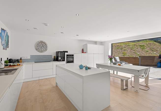The super sleek kitchen is ideal for sociable times.