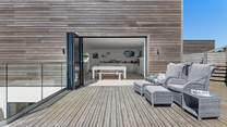 The outside area is perfect for morning coffee and al fresco dining.