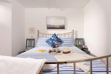 The main bedroom has a super-comfy king-size bed.