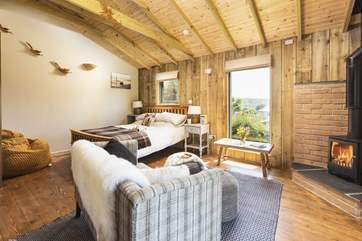 A beautiful open plan layout, with a wood-burner to keep you cosy.