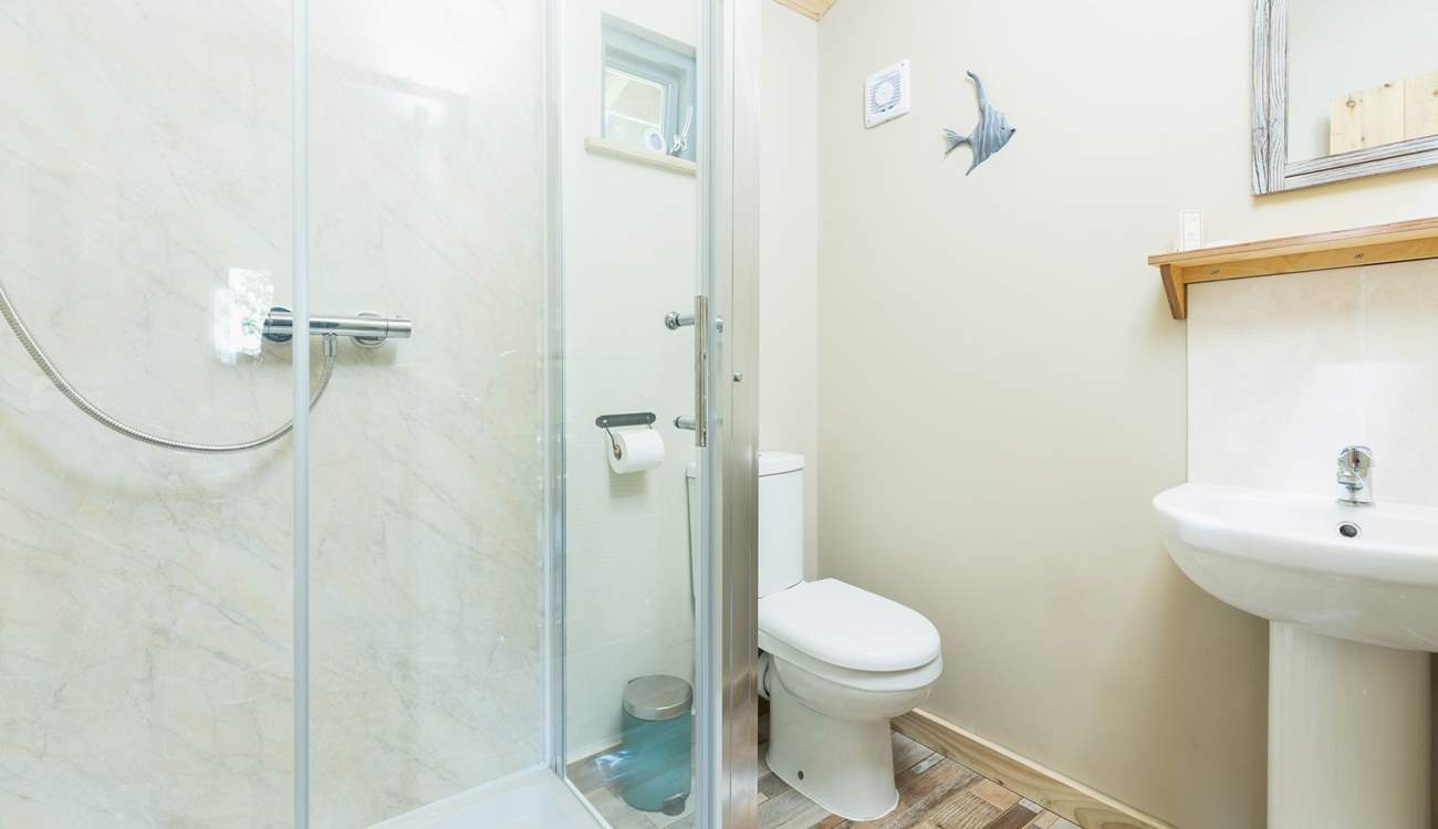 Freshen up in the en suite shower-room. 