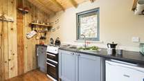 The kitchen is well-equipped. 