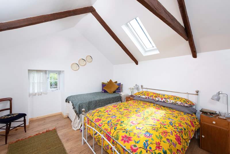The main bedroom with a comfy double bed and three-foot single. 