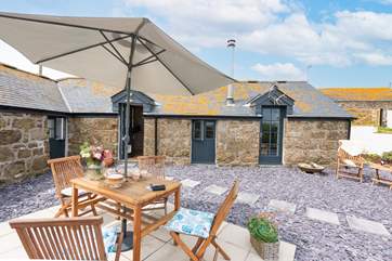 The terrace at The Pigsty, which overlooks neighbouring fields.