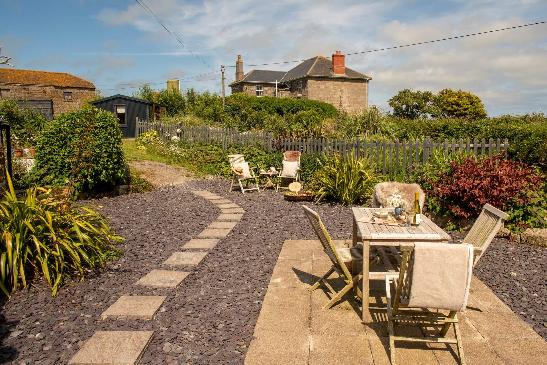 Follow the stepping stones and up the path, to reach The Hideaway and Mr Binx's Meadow. 