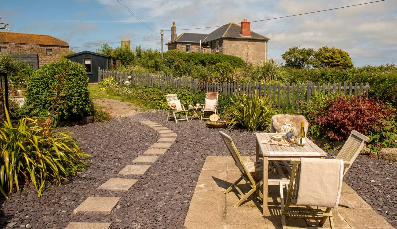 Follow the stepping stones and up the path, to reach The Hideaway and Mr Binx's Meadow. 