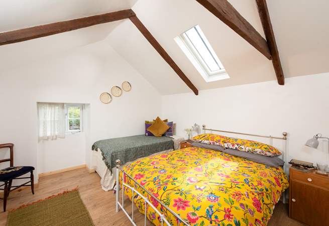 The main bedroom with a comfy double bed and three-foot single. 