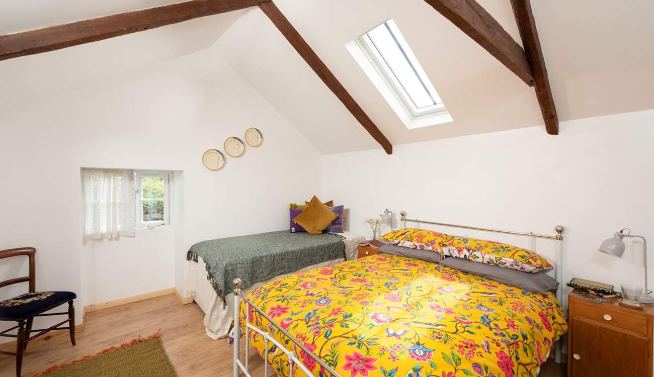 The main bedroom with a comfy double bed and three-foot single. 