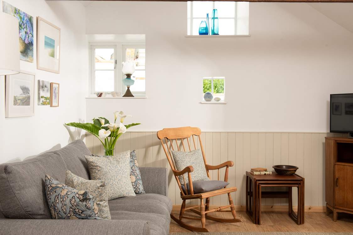 The Pigsty has a wonderful sitting-area with a stable-door that leads out onto the patio.