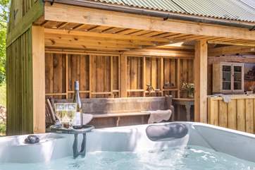 Wine and nibbles in the hot tub... what dreams are made of!