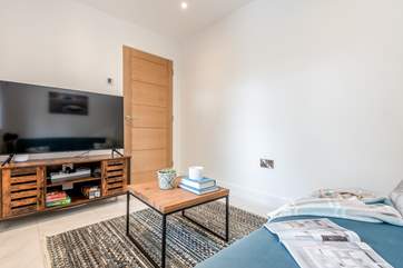The snug is kitted out with a Smart TV and games perfect for keeping everyone entertained.
