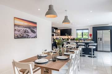 Bring the party together over a delicious meal at this wonderful dining-table.