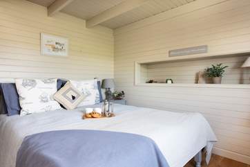 The lavish king-size bed provides the perfect night's sleep.