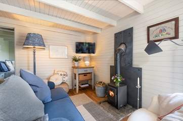 The comfy, cosy living area. Snuggle in by the fire and pour yourself a glass of red. Bo-Peep is the sweetest sanctuary.