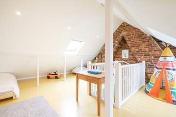 The children's bedroom on the second floor with twin beds; please note there is restricted head height.
