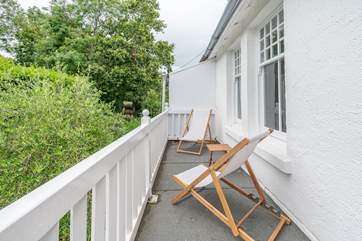 The balcony for the main bedroom is the perfect place to sit back with a good book under the Island sunshine.