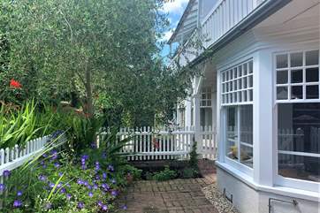 There is a lovely gated patio area to the front of the property.