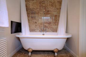 Divine, the roll-top bath in the en suite to bedroom two is the perfect place to relax.
